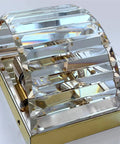 Close-up of Gold Crystal Wall Sconce with Beveled Prisms Dimmable 2 Light Premium Vibe Wall Lighting for Bedroom and Living Room.