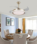 Ceiling Fan Light with Flush Mount Design, Integrated Illumination, Modern in dining room, featuring brass finish and soft light.
