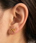 Gold Bow Stud Earrings For Women Titanium Flat Back Screw Back Hypoallergenic Nickel Free Lightweight worn on ear