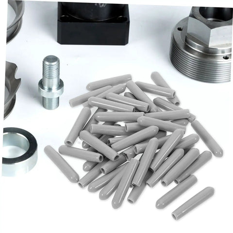 Huge Pack Of Dishwasher Rack End Caps And Tine Protectors Featuring A Hell Of An Easy Snap Installation For Modern Kitchens Solid Heavy Duty Replacement Parts That Really Fix Peeling Or Snapped Pegs In A Jiffy - gray plastic end caps piled with metallic tools.