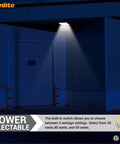 LED Outdoor Canopy Light Fixture With Power Selectable 30W, 40W Or 60W, 7800 Lumens illuminating a commercial doorway at night