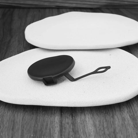 Black MINI Cooper Tow Hook Cover Cap 51121177907 on white background, durable plastic for R50 R53 R52 R55 R56 R57 bumpers, clip-on design.