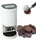 Automated Electric 58mm Coffee Tamper Slays Your Espresso Game With Adjustable Pressure Output Between 5 And 30Kg, showcasing touchscreen and used grounds.