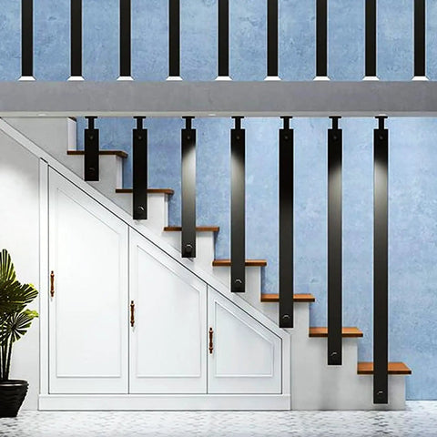 Rock Solid Matte Black Wrought Iron Handrail Adjustable Wall Mounted Stair Railing with Hella Grippy Nonslip Grip and Dang Easy Side Mount Brackets For A Badass Secure Way Upstairs installed beside a staircase.