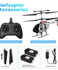 Beginner Friendly RC Helicopter With Auto Hover And Altitude Hold, remote, batteries, blades, and charger displayed