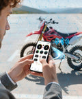 Person using phone app to adjust settings on motorbike via Programmable Bluetooth Dongle For Fardriver Controller And Soleil01 Bikes