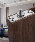 Close-up of Stainless Steel Concealed Pivot Hinge Delivering Smooth As Butter 360 Rotation For Cabinets on wooden cabinet frame.