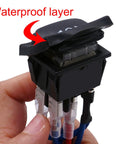Close-up of waterproof momentary polarity reverser switch 12V DC 10A, showing waterproof layer and harness for hoist crane and linear actuator.