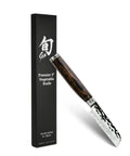 Premier 3 Inch Vegetable Knife With VG MAX Core and Damascus Stainless Steel Cladding next to packaging