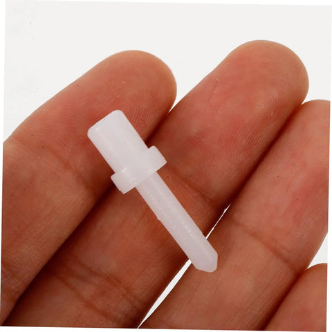 Close-up of a white plastic shutter replacement pin held between fingers, part of Shutter Replacement Pins And Plunger Bolts For Window Screens Feature Heavy Duty Design With Forty Pieces Of Spring Hardware To Give Broken Blinds A No Sweat Fix That Works Like A Dream Indoors Year Round At Home.
