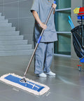 Heavy Duty Cotton Dust Mop Heads 2 Pack 24 Inch Lint Free Loop End Machine Washable Floor Cleaners being used on commercial floor.