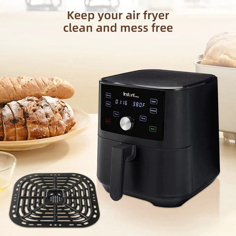 Instant Vortex 6 Qt Air Fryer Replacement Tray and Grill Plate next to air fryer, nonstick crisper rack visible