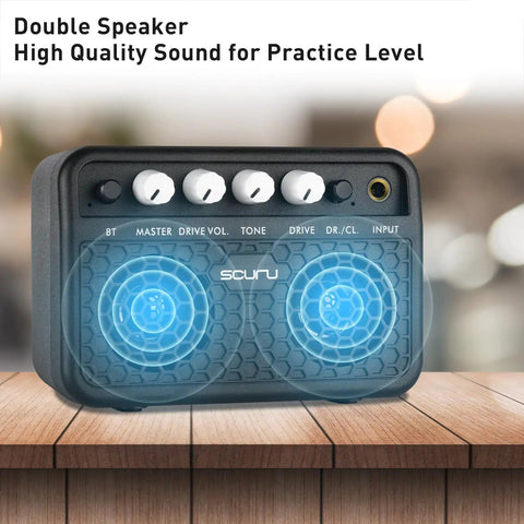 Guitar Mini Amp 5W Rechargeable Bluetooth Amplifier for Desktop Practice with clean and distortion channels on wooden surface