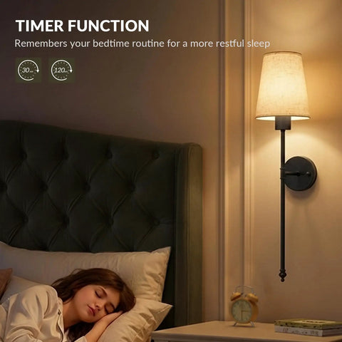 Konvixon Wall Sconces Battery Operated Set of Two, RGBWW with Remote, Black illuminating a bedside, creating warm ambiance.