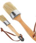 Oval Synthetic Bristle Paint Brush Set With Wooden Handle For Walls, showing two brushes with natural handles and hanging loops.