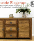 Rustic wooden cabinet with decorative metal handles and a vase with flowers on top, emphasizing farmhouse decor.