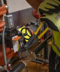 Worker using 10 Inch Quick Adjust Tongue And Groove Pliers With Push Button Ratchet For Fast Positioning on pipe fitting
