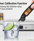 Instant Read Meat Thermometer With 1-Second Accuracy measuring ice water with backlit LCD displaying 32°F in kitchen setting.