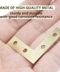 Heavy Duty 40 Pack L Corner Brackets Gold 1.5 Inch Steel Decorative Mounting Braces For Picture Frames And Furniture Reinforcement Tough As Nails Super Sturdy Rust Proof Diy Woodworking Supports in hand