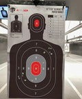 Silhouette Target Pack 23x35 Inch Paper Targets For Indoor Outdoor Range Practice with head and torso zones in shooting lane.