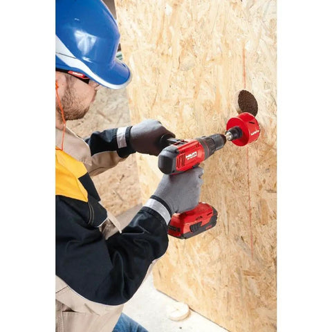 Half Inch Cordless Hammer Drill Driver Tool Body Only With Lithium Ion Power used on wood panel by worker wearing helmet and gloves