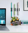 Adhesive Wall Pen Holder 6 Pack Silicone Pencil Marker Stylus Organizer Dual Hole Design on a wall beside a desk