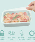 Hand sealing lid on 20-Piece One-Compartment Meal Prep Containers With Lids PFAS And BPA Free Materials, salad inside.