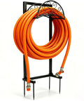 Heavy Duty Stainless Steel Garden Hose Reel With Triangle Reinforcement Brace Built Tough For Outdoor Use Supports Up To 150 Foot Hose Black Weather Resistant displaying orange hose coiled neatly on reel.
