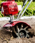Gas Powered Tiller Cultivator Lightweight 20 Pound Yard Tool With Folding Handles And Carrying Handle Easy Storage in use