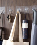 Heavy Duty Self Adhesive Hooks 50 Pack Waterproof Shower Wall Mounts No Drill Damage Free Reusable Utility Holders That Stick Like Crazy And Keep Things Tidy Without The Hassle, holding keys, bags, and umbrellas.