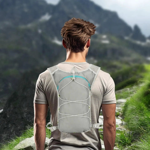 Man wearing 2L Hydration Backpack With Ultra Lightweight Breathable Mesh Reflective Vest And Ergonomic Adjustable Straps for hiking