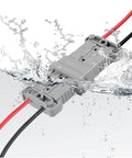 IP68 Waterproof 50 Amp Battery Quick Connect and Disconnect Kit for 6 to 8 Gauge Jumper Cables submerged under water in grey