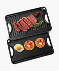 Reversible Cast Iron Grill And Griddle Pan Fourteen By Eight And A Half Inch with steak, waffles, and egg on dual surfaces