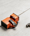 DIY Friendly Flooring Suction Cup Tool for Quick Heavy Duty Floor Fix on laminate with a hammer.