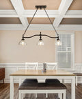 3-Light Kitchen Island Pendant Light Fixture With Clear Glass Shades Rustic Black Farmhouse Chandelier above dining table