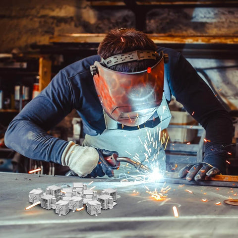 Welder using 24 Pack Butt Welding Clamps Pro Grade for Edge to Edge Welding on auto body panel, sparks flying in workshop
