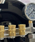 Killer Heavy Duty Workhorse Rotating Water Spray Featuring One Hundred Foot Telescopic Manual Hose Reel Built With Pressure Regulating Valve, showing brass fittings and pressure gauge.