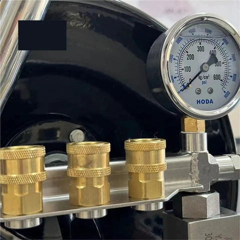 Killer Heavy Duty Workhorse Rotating Water Spray Featuring One Hundred Foot Telescopic Manual Hose Reel Built With Pressure Regulating Valve, showing brass fittings and pressure gauge.