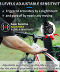 Person installing Wireless Remote Bike Alarm With 115dB Siren Motion Sensor 3 Level Volume on bicycle