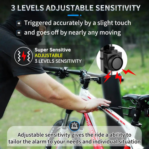 Person installing Wireless Remote Bike Alarm With 115dB Siren Motion Sensor 3 Level Volume on bicycle