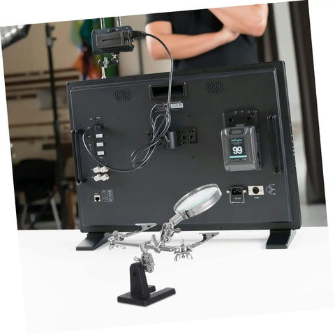 Back view of Pro Grade Repair Clip Magnifying Mirror And PCB Holder in use, showing flexible arms and magnifying glass.