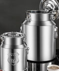 Heavy Duty 304 Stainless Steel Storage Bucket With Secure Airtight Lids For Bulk Rice Grains Coffee Beans Dog Food And Liquids Commercial Grade Kitchen Setup Hella Tough 16.9 Gallon Capacity No Mess stacked on a countertop.