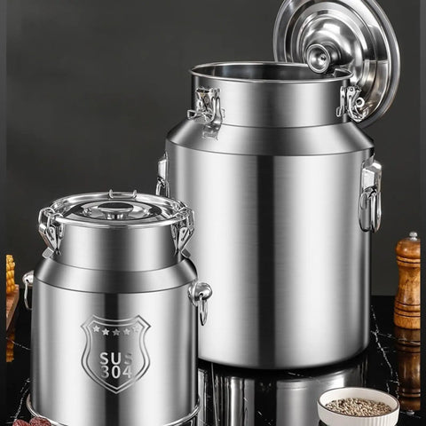 Heavy Duty 304 Stainless Steel Storage Bucket With Secure Airtight Lids For Bulk Rice Grains Coffee Beans Dog Food And Liquids Commercial Grade Kitchen Setup Hella Tough 16.9 Gallon Capacity No Mess stacked on a countertop.