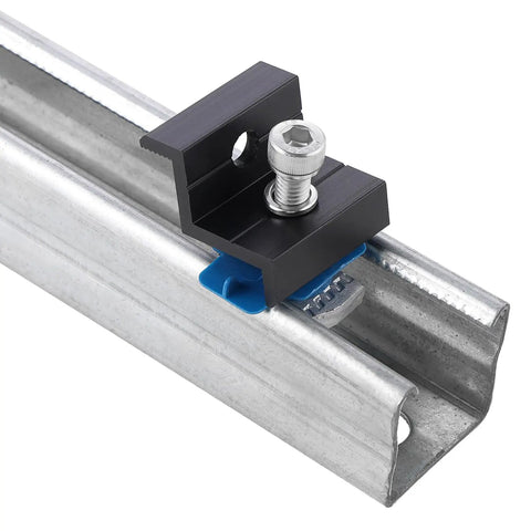 Top Shelf Heavy Duty End Clamps For Solar Arrays mounted on 1-5/8 inch strut channel with silver and black colors.