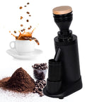 Heavy Duty Titanium Plated Conical Burr Coffee Grinder with coffee splashing from cup and ground coffee beside it.
