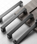 30 Pack 5 Inch Square Matte Black Cabinet Handles For Cabinets Drawers And Dressers, shown on a white tile surface.