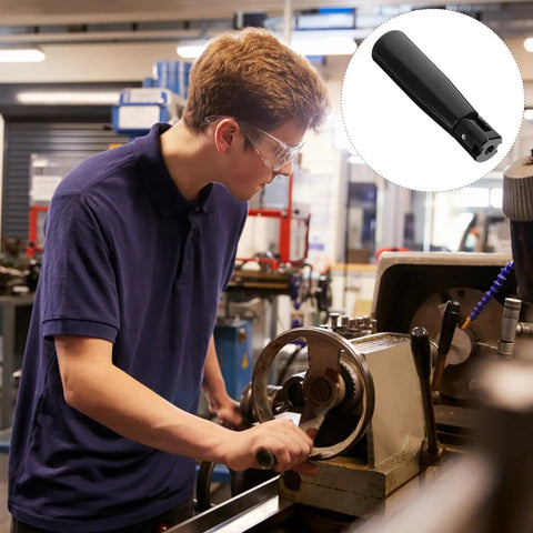 Heavy Duty Black Bakelite Folding Swivel Crank Handle For Machines in use, attached to a lathe for better control.