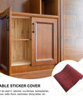 Self Adhesive Vinyl Wallpaper Roll For Kitchen Cabinets Showcasing Real Deal Wood Grain Pattern on open cabinet.