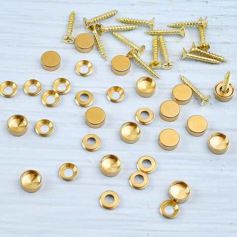 16 Pack Sweet Looking Brass Decorative Screw Caps And Covers Half Inch Vintage Hardware Finishers For Furniture Mounting showing matte gold caps and screws.