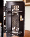 Inside view of Dope Fire Extinguisher Mini Bar, showing lockable storage for two shot glasses and a bottle compartment.